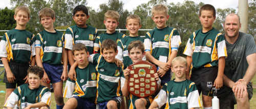 Steve Bell Challenge winners St Patrick’s under-10 with Bell (right) defeated Dysart in the final 20-8 at McIndoe Park on Friday. Steve Bell Challenge winners St Patrick’s under-10 with Bell (right) defeated Dysart in the final 20-8 at McIndoe Park on Friday.